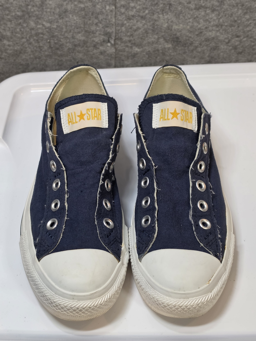 Converse All Star Slip-On Canvas Sneakers in Navy